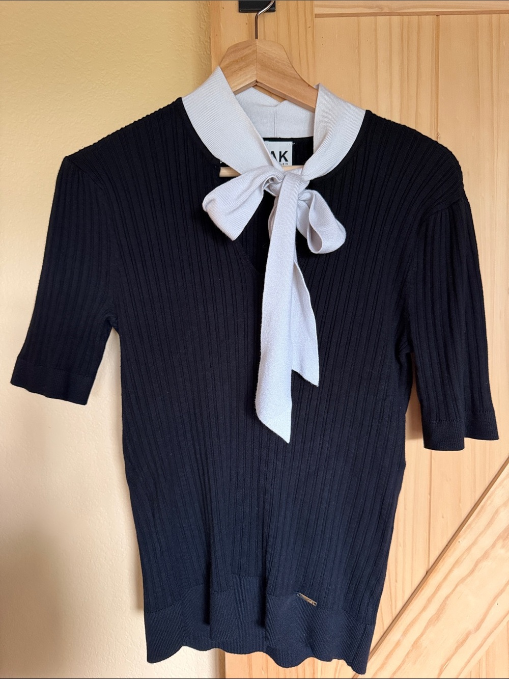 Anne Klein Navy Ribbed Knit Top with White Tie Neck Bow